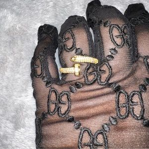 Adjustable Yellow Gold plated nail ring with cubic zirconia diamonds.